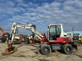 2018 Takeuchi TB295W wheel excavator side view