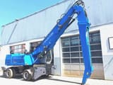 2012 Fuchs MHL350E FQC material handler, side view