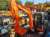 2019 Hitachi ZX55UR mini excavator, front three-quarter view