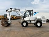 2013 Mecalac 12MXT wheel excavator side view