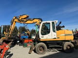 2006 Liebherr A314 wheel excavator, side profile view