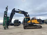 2019 Volvo EC300EL crawler excavator side view with drilling attachment