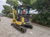 2023 Komatsu PC35 mini excavator, rear three-quarter view