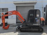 Doosan DH60-7 mini excavator, side view
