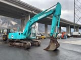 2000 Kobelco SK210NLC-6 crawler excavator, side view