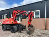 2004 Atlas 1404 MK wheel excavator side view