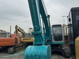 2018 Kobelco SK200 crawler excavator, front view of bucket and boom