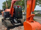 2024 Hitachi ZX70 mini excavator, front three-quarter view
