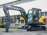 2026 Hyundai HX60G mini excavator, side profile view