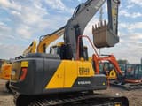 2021 Volvo EC140 crawler excavator, rear three-quarter view