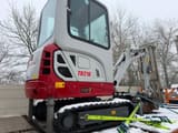 2023 Takeuchi TB216 V4 mini excavator, rear three-quarter view