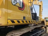 2024 Caterpillar 320GX crawler excavator side profile