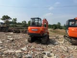 2022 Doosan DH55 mini excavator, rear view