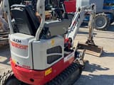 2023 Takeuchi TB210R mini excavator, rear three-quarter view