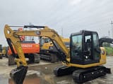 2022 Caterpillar 305.5E2 mini excavator, side view