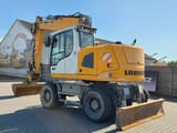 2014 Liebherr A918 COMPACT wheel excavator, rear three-quarter view