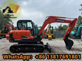 2024 Doosan DX60-9C mini excavator, side view
