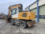 2015 Liebherr A918 wheel excavator, rear three-quarter view