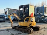 2007 Caterpillar 303C mini excavator, rear three-quarter view