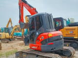 2024 Kubota U48-4 mini excavator, rear three-quarter view