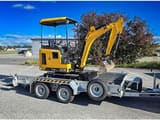 2021 JCB 16C-1 mini excavator on trailer, side view