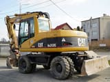 2003 Caterpillar M313C wheel excavator, side view