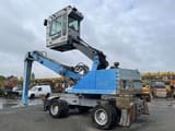 2011 Fuchs MHL335 material handler, side view