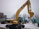 Koparka gąsienicowa Caterpillar 320CL z 2021 roku, widok z boku