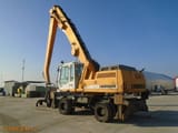 2003 Liebherr A934B material handler, rear three-quarter view