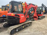 2024 Kubota U55-4 mini excavator, rear three-quarter view