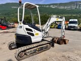 2010 Kubota U25-3EU mini excavator, rear three-quarter view