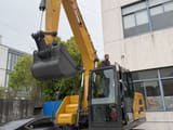 2026 XCMG XE135 crawler excavator, front three-quarter view