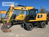 2015 Caterpillar M318F wheel excavator side view