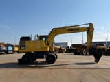 2019 Komatsu PW180-11 wheel excavator, side profile view