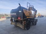 2020 Hyundai HW140 wheel excavator, rear three-quarter view