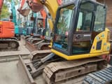 2010 Komatsu PC70 mini excavator, front three-quarter view