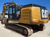 2014 Caterpillar 324ELN crawler excavator, rear three-quarter view