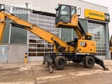 2020 Caterpillar MH3024-06C material handler, side view
