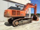 2015 Hitachi Zaxis 520LCH excavator, rear three-quarter view