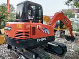 2022 Doosan DH55 mini excavator rear three-quarter view