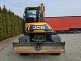 2016 JCB Hydradig 110W wheel excavator, front view with blade