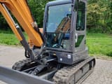 2022 CASE CX60C mini excavator, side view