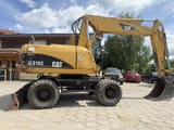 2004 Caterpillar M315C wheel excavator side view
