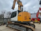 2022 Liebherr R936 Compact crawler excavator, rear three-quarter view