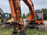 2009 Doosan DX255LC crawler excavator, front three-quarter view