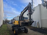 2020 Volvo EW60E wheel excavator, front three-quarter view