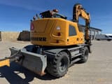 2016 Liebherr A910 COMPACT wheel excavator, rear three-quarter view
