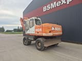 2001 Atlas 1404 wheel excavator, rear three-quarter view