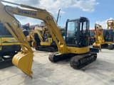 2022 Komatsu PC-55MR mini excavator, front three-quarter view