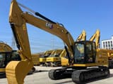 2024 Caterpillar 323 crawler excavator, front three-quarter view